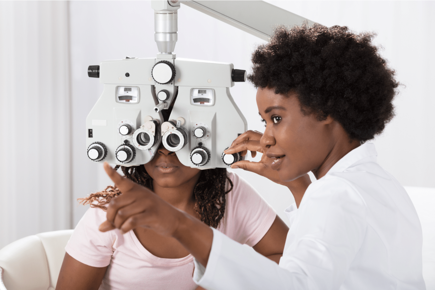 Female optometrist checking a patient's eyesight